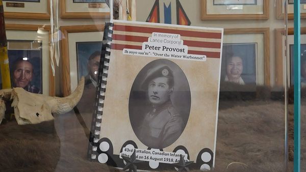 Piikani Nation high school students visit grave of fallen soldier in France
